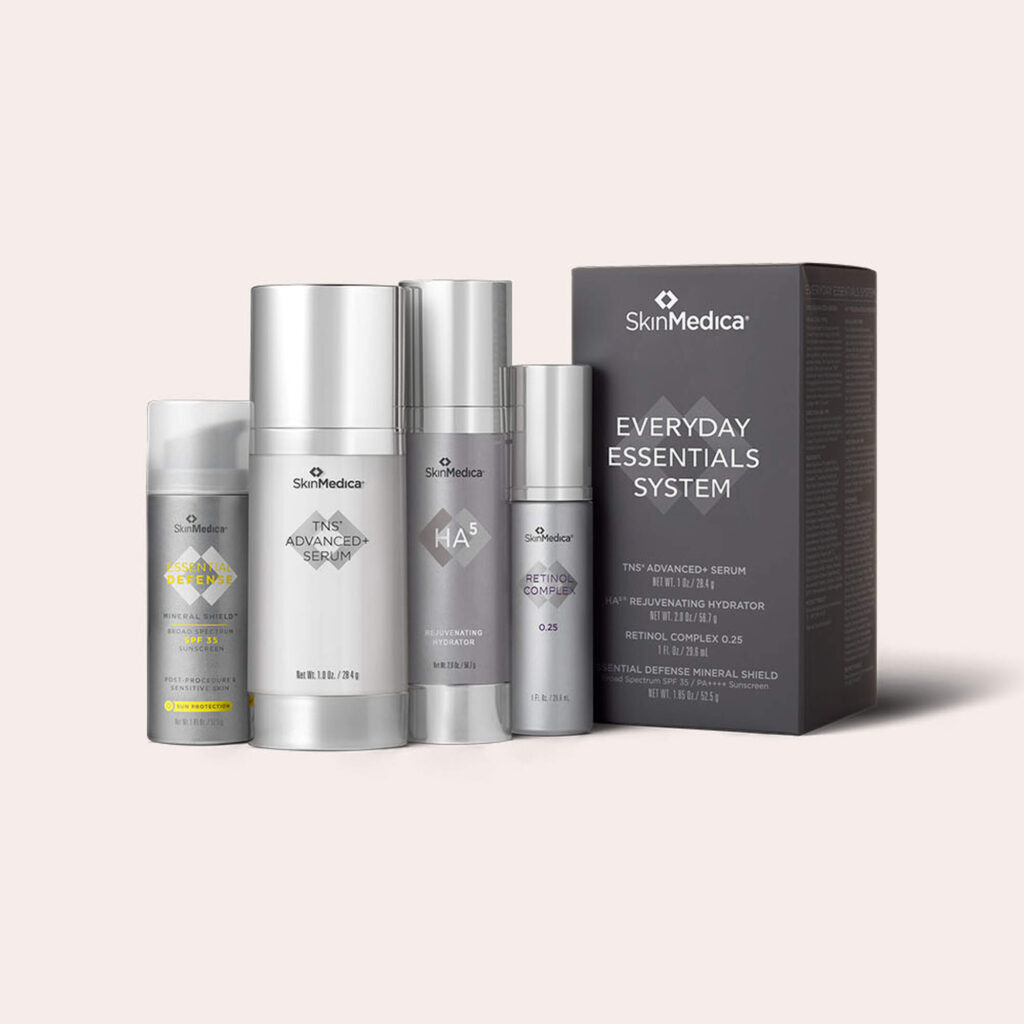 A studio shot of several SkinMedica products grouped together against a simple background. These medical grade skincare products are often chosen to support a patient's facial rejuvenation in Pembroke Pines.